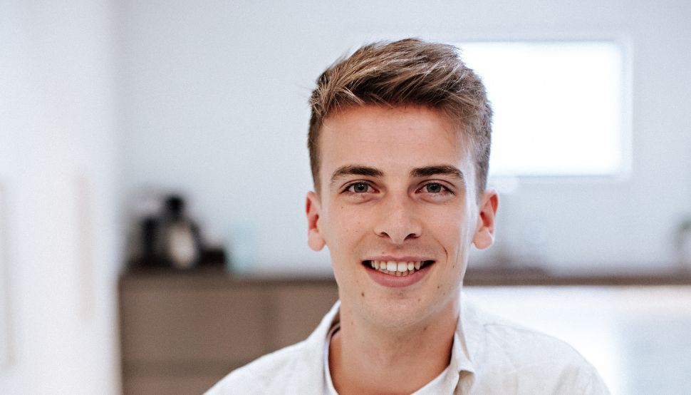 Harry Flett PRoduct Lead at Tracksuit head shot (1).jpg